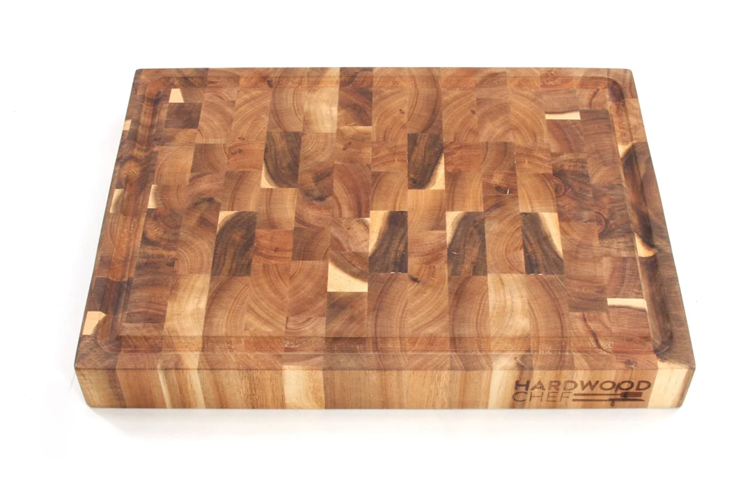 Hardwood Chef acacia end grain cutting board seen from above, showing the checkerboard of wood blocks and the juice groove